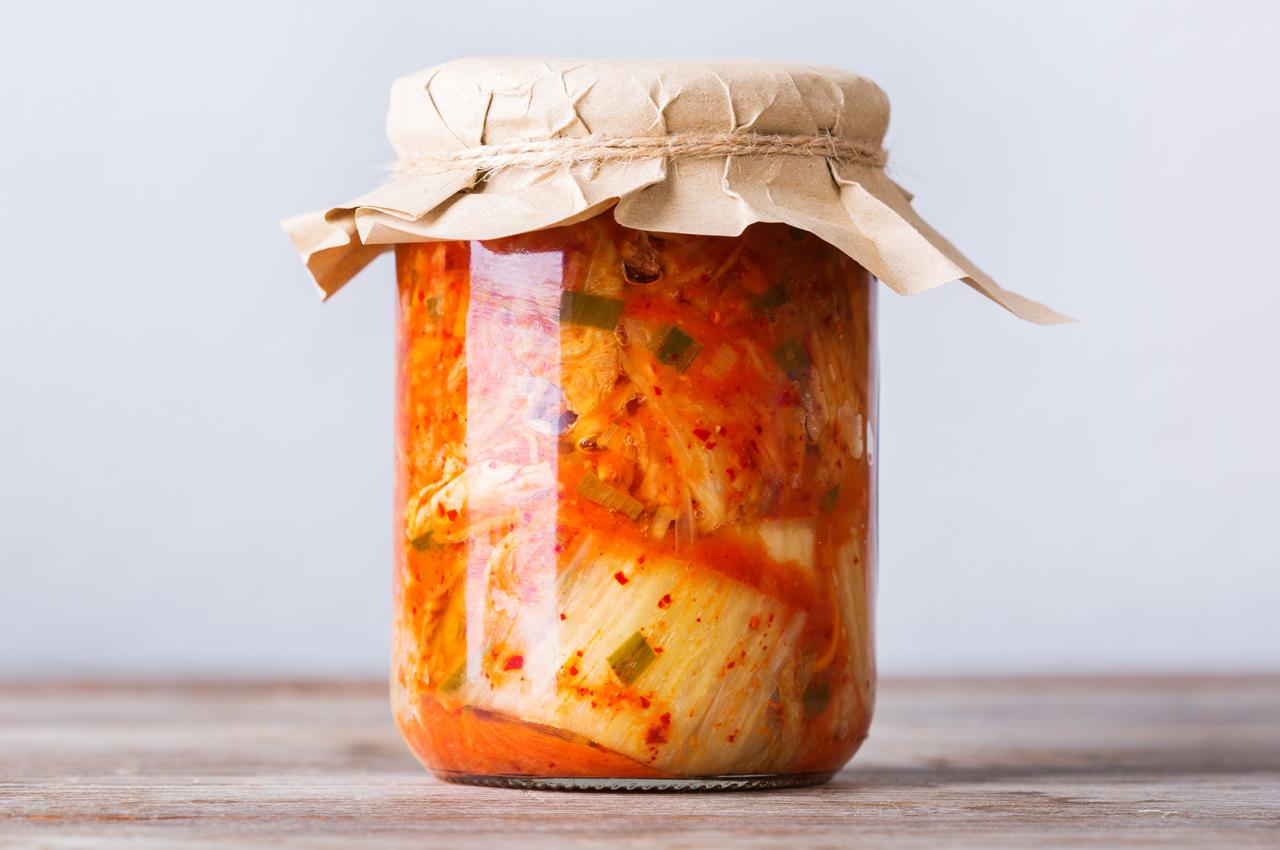 Homemade kimchi in a glass jar