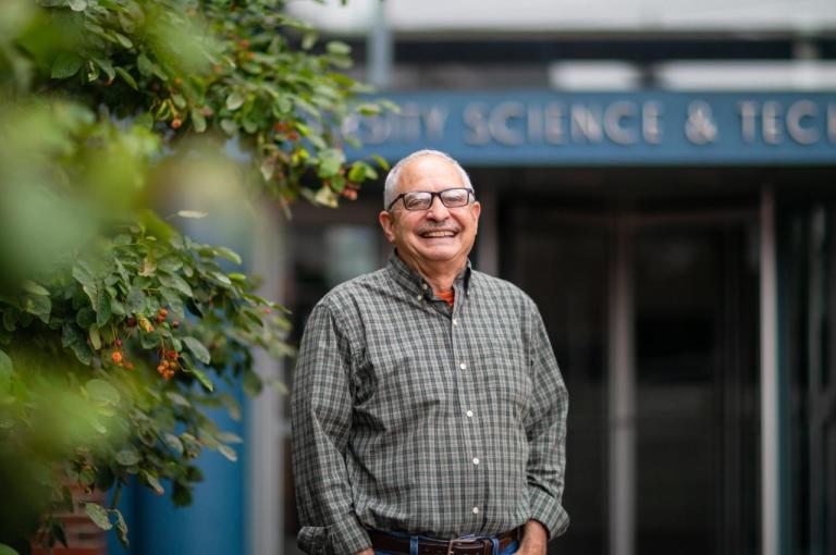 David Kaplan standing outside the Science and Engineering Center building. He is named a fellow of the National Academy of Inventors